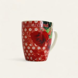 Taza de cerámica con un diseño floral en tonos rojos y blancos.