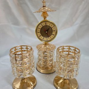 Reloj de sobremesa dorado con una base de cristal+adornos