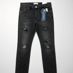Vaqueros negros con pedrería y rotos